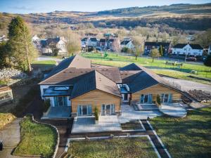 an aerial view of a house with a yard at Suite 7 - Sleeping Giant Hotel - Pen Y Cae Inn in Brecon