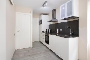Kuchyňa alebo kuchynka v ubytovaní White Sea by Seasidehomes