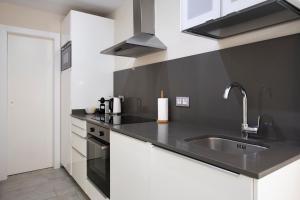 Kuchyňa alebo kuchynka v ubytovaní White Sea by Seasidehomes