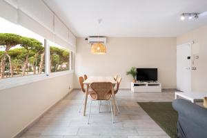 Televízia a/alebo spoločenská miestnosť v ubytovaní White Sea by Seasidehomes