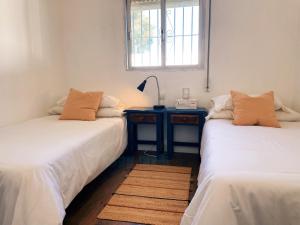 Postel nebo postele na pokoji v ubytování La Posada de Trafalgar