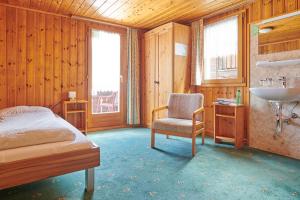 Postel nebo postele na pokoji v ubytování Hotel Weisshorn