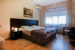  Кровать или кровати в номере Apartamenty na Moskovskoy 