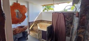 Postel nebo postele na pokoji v ubytování finca hotel palmas frente a panaca