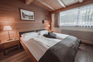 Posteľ alebo postele v izbe v ubytovaní Hotel Continental Dolomites