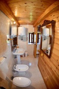 Vonios kambarys apgyvendinimo įstaigoje Casa Lia