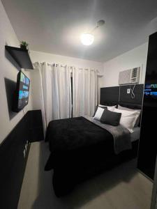 Ліжко або ліжка в номері Arte & Luxo Resort Barra - Jeunasse arena.