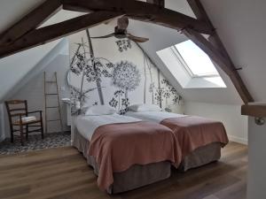 Llit o llits en una habitació de Une escale en Berry