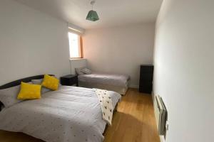 Postel nebo postele na pokoji v ubytování Vera’s Penthouse