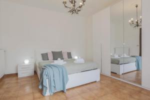 Postel nebo postele na pokoji v ubytování MaisonTuscany - Jacuzzi