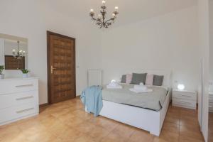 Postel nebo postele na pokoji v ubytování MaisonTuscany - Jacuzzi