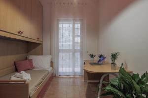 Postel nebo postele na pokoji v ubytování MaisonTuscany - Jacuzzi