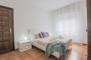 Postel nebo postele na pokoji v ubytování MaisonTuscany - Jacuzzi