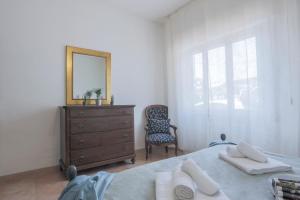 Postel nebo postele na pokoji v ubytování MaisonTuscany - Jacuzzi