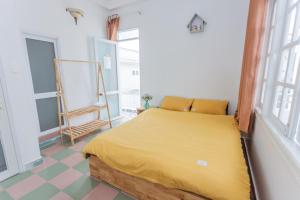 Postel nebo postele na pokoji v ubytování CSLTDL Địa Du + 10 fotografií