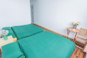 Postel nebo postele na pokoji v ubytování CSLTDL Địa Du