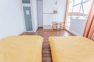 Postel nebo postele na pokoji v ubytování CSLTDL Địa Du