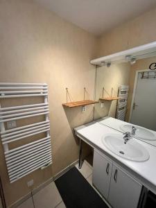 Et badeværelse på Appartement (CERGY)