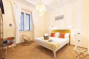 Postel nebo postele na pokoji v ubytování Cagliari Old Town B&B