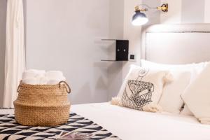 Postel nebo postele na pokoji v ubytování Cagliari Old Town B&B