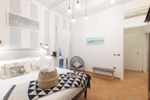 Postel nebo postele na pokoji v ubytování Cagliari Old Town B&B