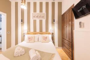 Postel nebo postele na pokoji v ubytování Cagliari Old Town B&B