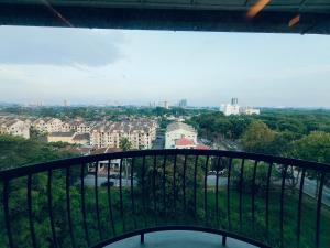 a view of a city from a balcony at Melaka Homestay Golden Royal in Melaka