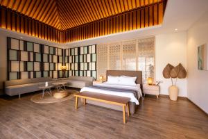 Voodi või voodid majutusasutuse Ream YoHo Resort toas