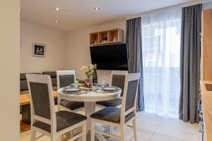 TV a/nebo společenská místnost v ubytování Apartment Piesendorf
