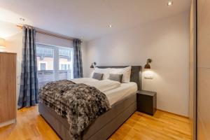 Ένα ή περισσότερα κρεβάτια σε δωμάτιο στο Apartment Piesendorf