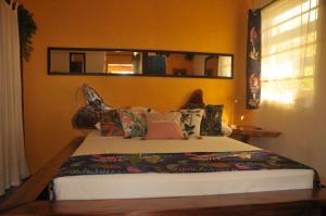 Postel nebo postele na pokoji v ubytování Mango Island Lodges
