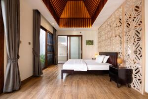Voodi või voodid majutusasutuse Ream YoHo Resort toas