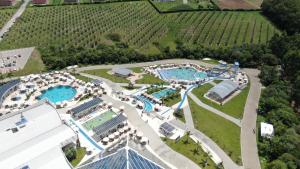 an aerial view of a resort with two pools at Hotel Recanto Business Center in Restinga Sêca