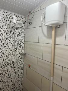a bathroom with a shower with a toilet at Rancho São Francisco in São Roque de Minas