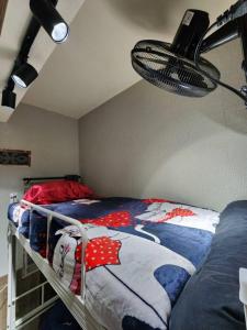 A bed or beds in a room at 113 Quiet and Cozy Loft Apartment with free Wi-fi