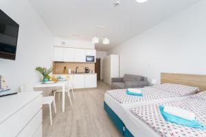 Kuchyň nebo kuchyňský kout v ubytování Apartamenty Nadmorska 104 Sunset Resort
