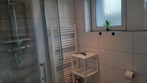 Ένα μπάνιο στο Work & Stay Apartments- mit Einzelzimmer