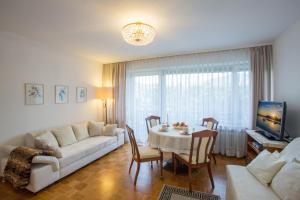 TV a/nebo společenská místnost v ubytování Landhaus Alpenblick