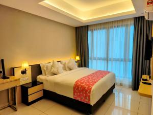 En eller flere senge i et værelse på Genting Peak 4PaxStudio420R at Grand Ion Delemen + 42 billeder