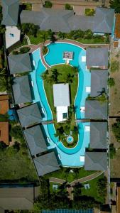 an aerial view of a swimming pool in a yard at AWARA POUSADA BOUTIQUE in São Miguel do Gostoso
