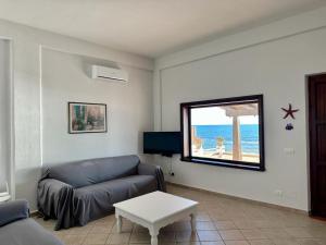 Μια τηλεόραση ή/και κέντρο ψυχαγωγίας στο Le Sorelle Villa sul mare