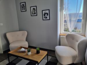 Posezení v ubytování Au Clos du Célé
