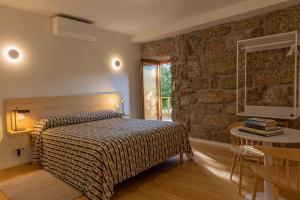 Uma cama ou camas num quarto em Quinta Do Crestelo Aparthotel