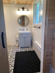 A bathroom at Brand new, private oasis on 18 acres in Erin