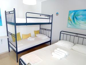 Vuode tai vuoteita majoituspaikassa Sunloft-Paros