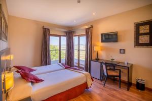 Postel nebo postele na pokoji v ubytování Hotel Andalussia