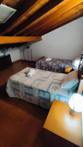 Llit o llits en una habitació de Casa Lopes