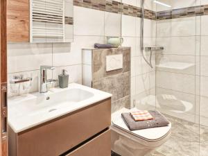 Koupelna v ubytování Appartements & Chalets Wiesenruh
