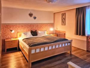 Posteľ alebo postele v izbe v ubytovaní Appartements & Chalets Wiesenruh