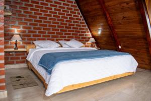 Postel nebo postele na pokoji v ubytování Destinos Exclusivos Patate